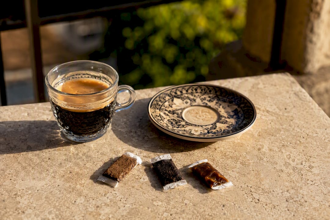 Nicotine pouches styled with espresso cup