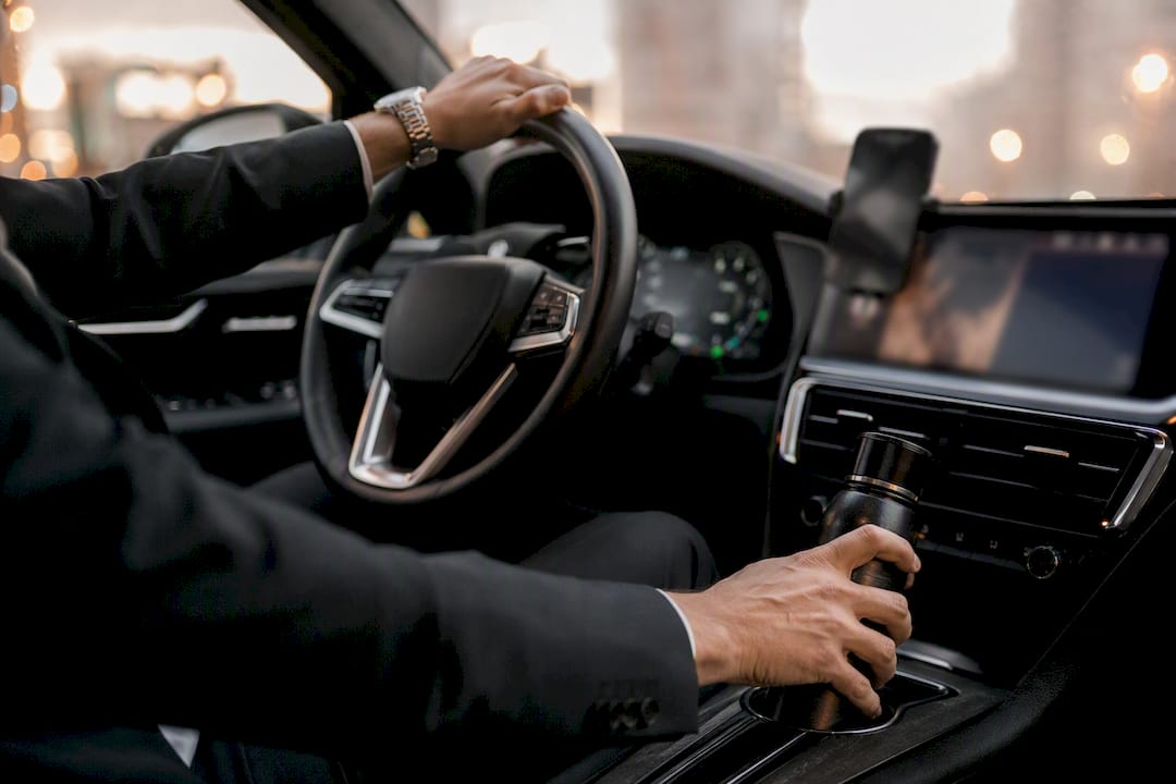 Driver preparing vehicle interior for gig use